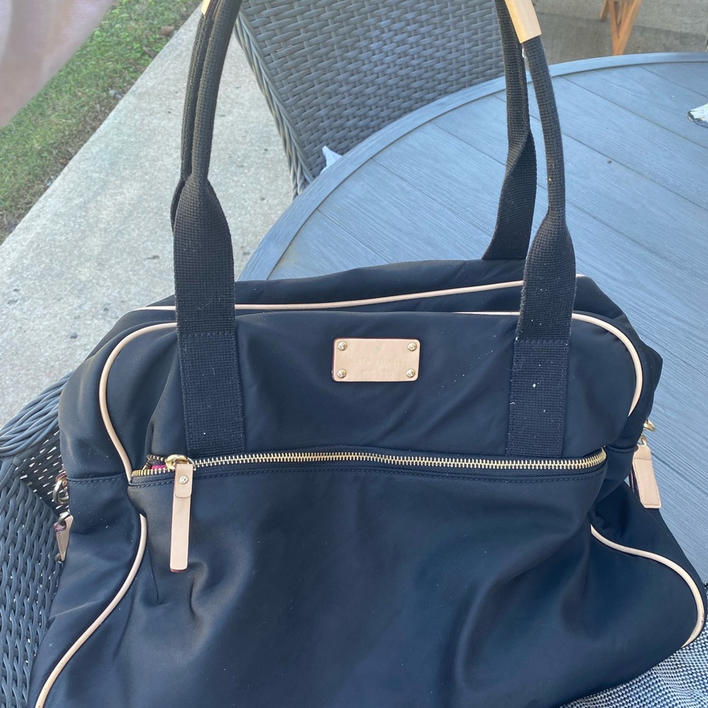 kate spade overnight/weekend bag. i used it for a diaper bag. great condition